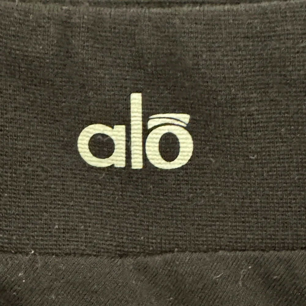 Black asymmetrical, cotton wrap skirt by Alo. Size small. Lightweight cotton